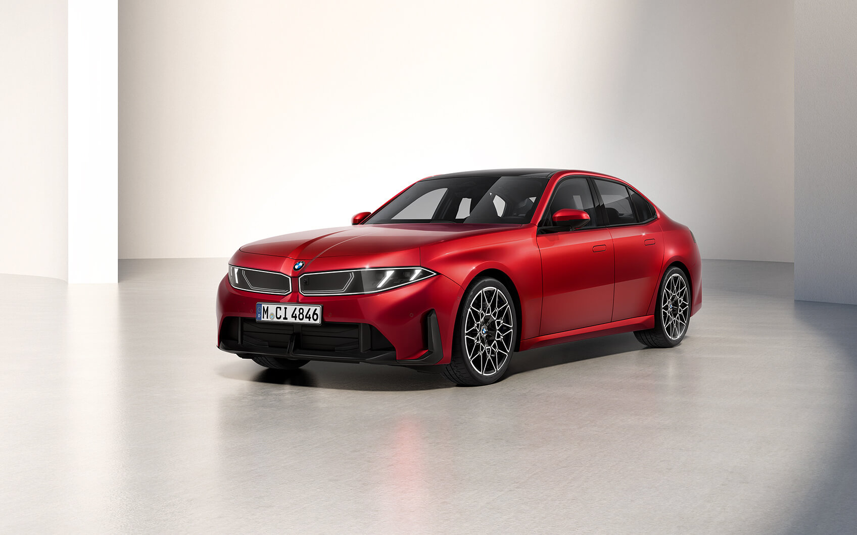 Rote BMW 3er Limousine in der Frontansicht von schräg vorne.